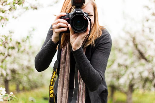 woman taking photos up close jp danko toronto commercial photographer