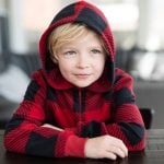 Portrait of blonde little boy (7) with messy hair in the morning