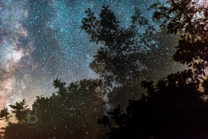 An abstract double exposure of the Milky Way galactic centre made by moving the camera during capture.