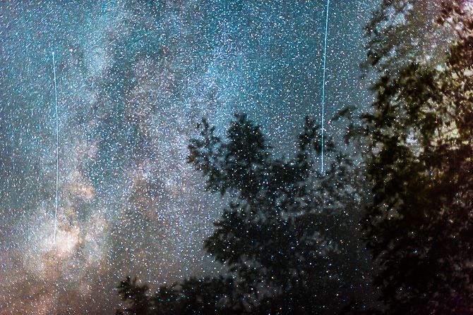 An abstract double exposure of the Milky Way galactic centre made by moving the camera during capture.