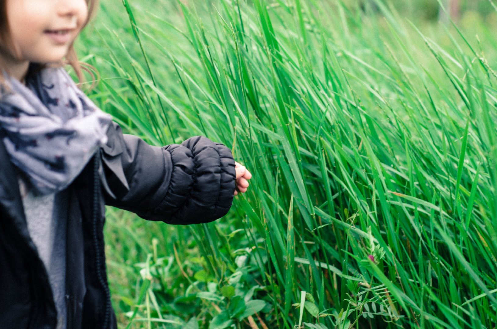 child in grass