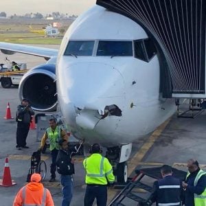 Watch: passenger opens a tiny plane window to take a photo, camera