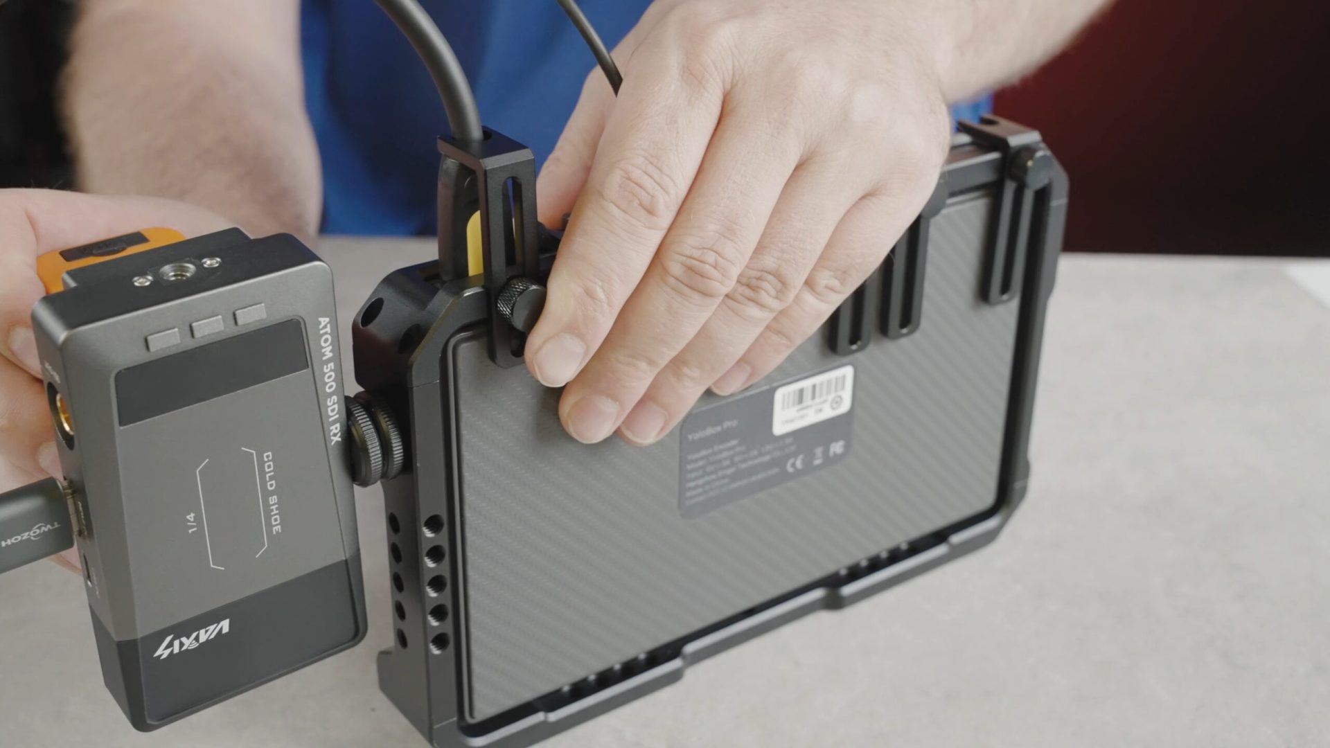 Yolobox Pro vs Feelworld l2 vs ATEM mini Pro - The YC onion cage with a transmitter