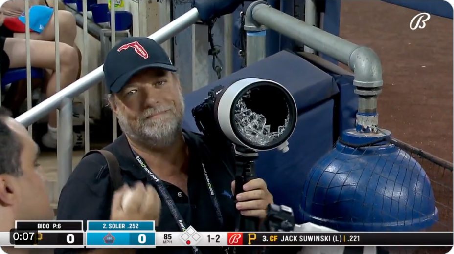 Sports photographer has $12,000 lens smashed by foul ball