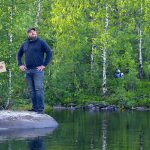 man standing on a rock in "Finland"