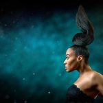 Beauty Portrait with Gravity Defying hair cyan background thumbnail