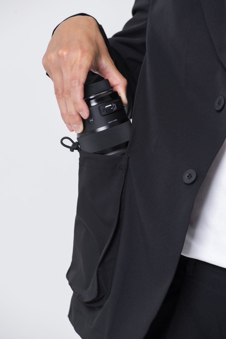 Would you wear this suit designed especially for photographers?