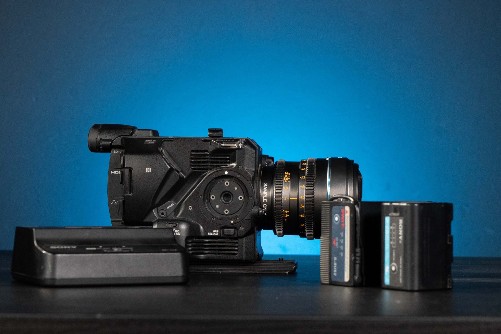 Sony FS5ii next to batteries and charger