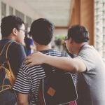 Three Men Standing Near Window school