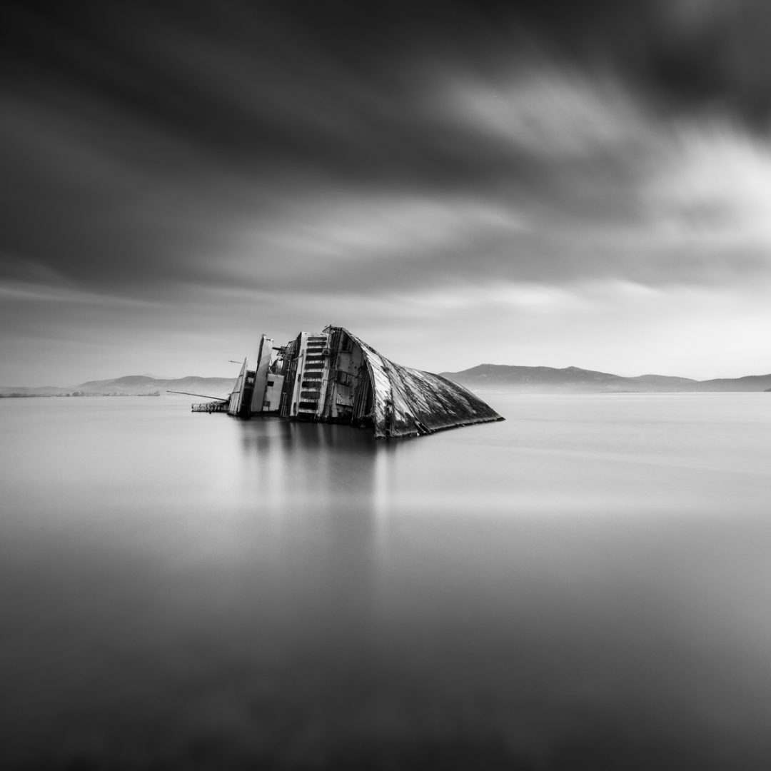 George Digalakis black and white sinking boat