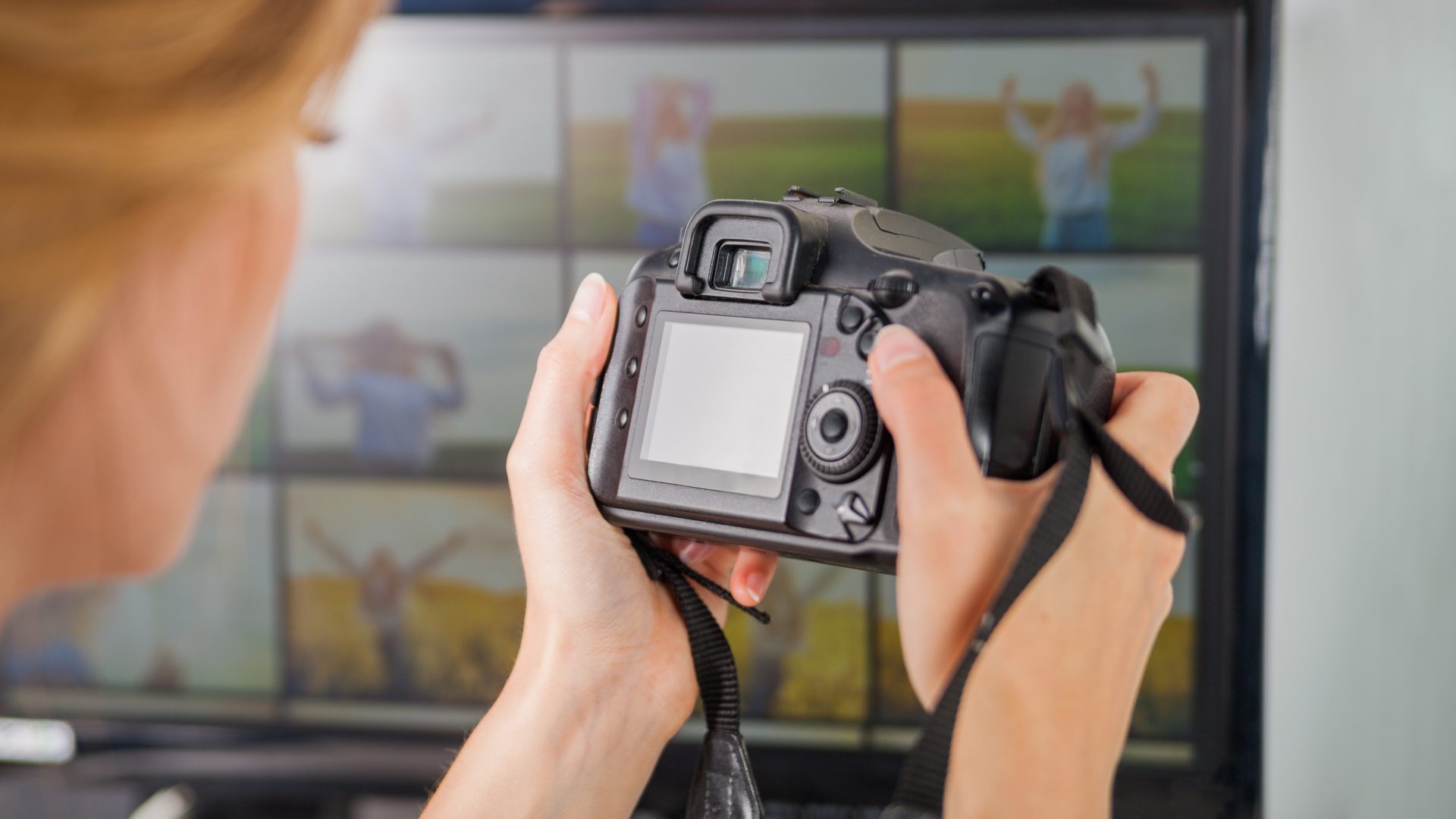 Freelance photographer woman at home office editing photos