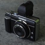 Figure 1. Pint-sized fisheye system featuring the Olympus 9mm body cap fisheye lens mounted on an Olympus Pen E-PL1.