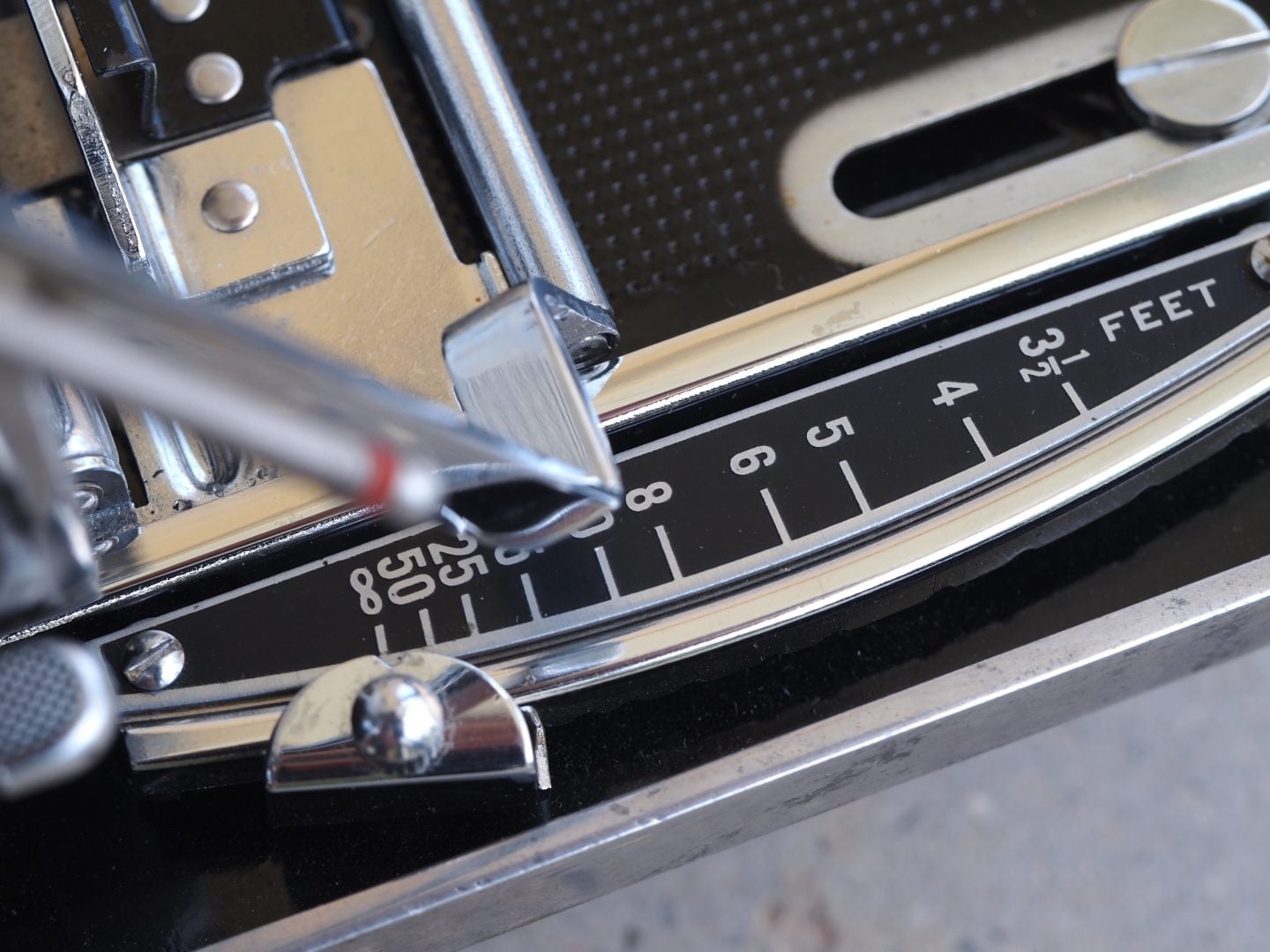 Figure 5. Slide the front lens standard back until the support roller is near the 8-foot focusing scale mark.
