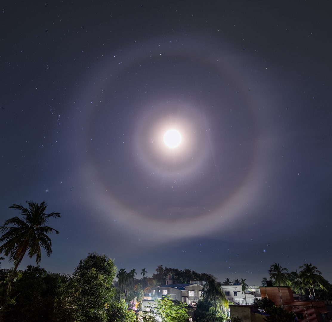 A 22-degree lunar halo accompanied by a smaller 9-degree halo