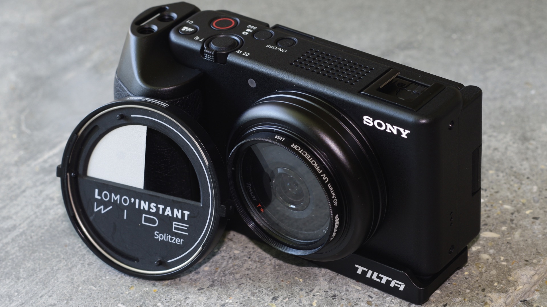 splitzer for holding in front of lens