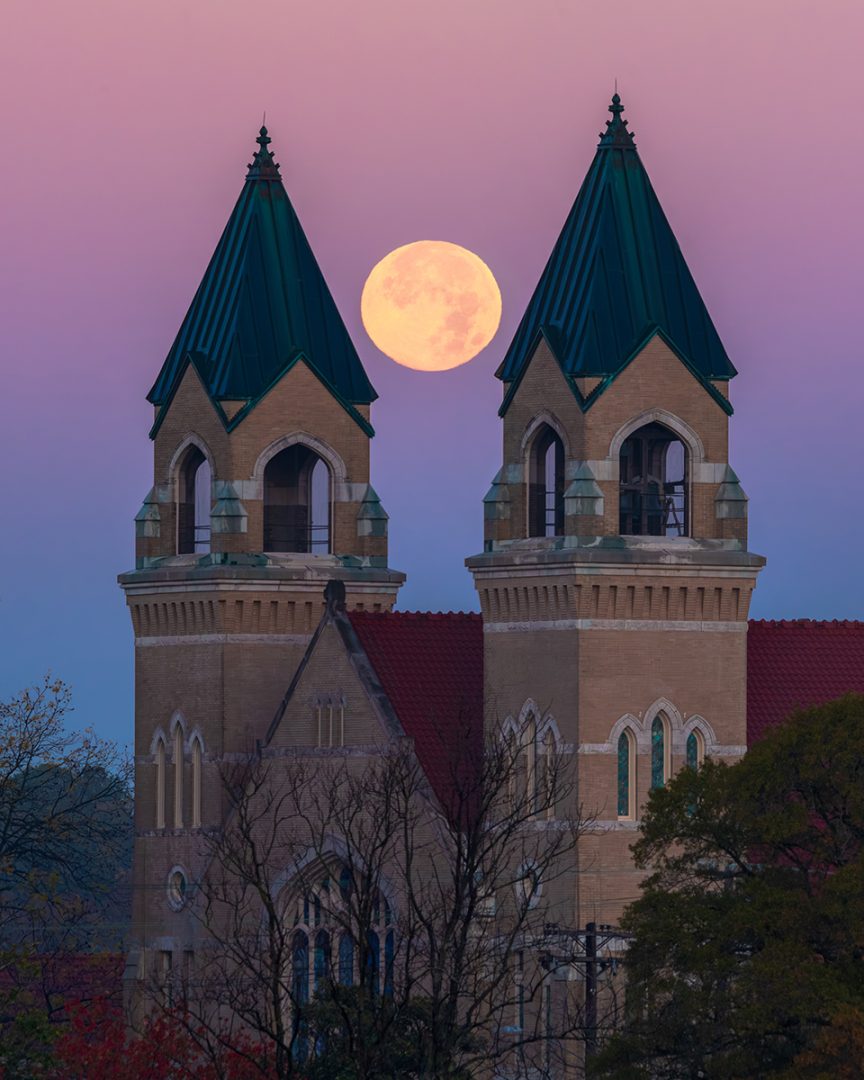 Moon rising behind Duke Memorial United Methodist Church