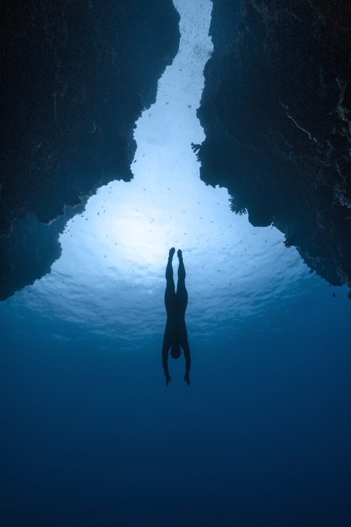 This award winning photographer free dives for the perfect shot