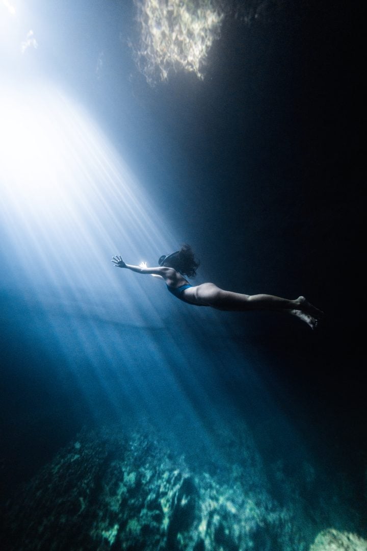 This award winning photographer free dives for the perfect shot