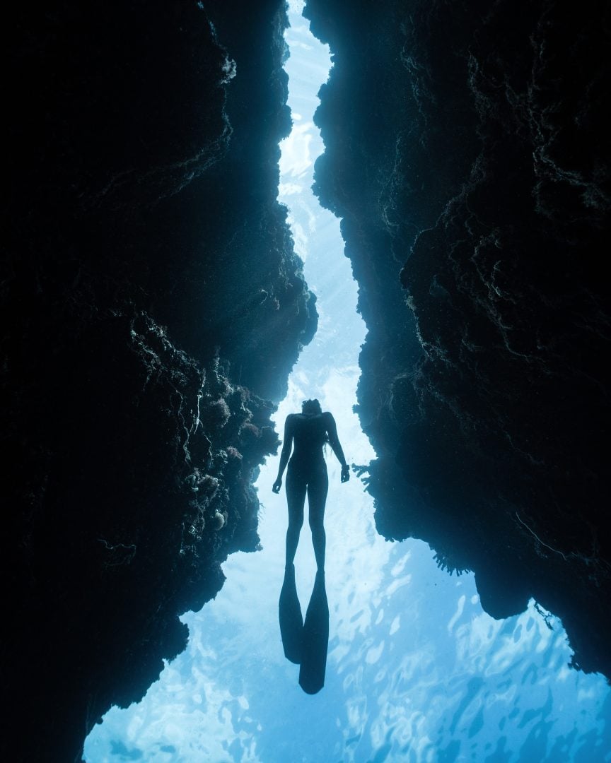 This award winning photographer free dives for the perfect shot