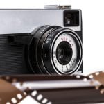 Old Film Camera Isolated on White Background