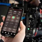 a smartphone displaying the ARRI Camera Companion App interface, remotely controlling settings on a professional ARRI cinema camera setup.