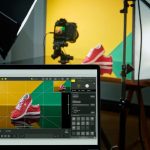 The screen displays Nikon NX Tether software with live capture and adjustment tools, highlighting advanced photo and video capabilities.