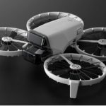 Compact DJI Flip drone with built-in propeller guards and front-facing camera, displayed on a dark surface for product showcase.