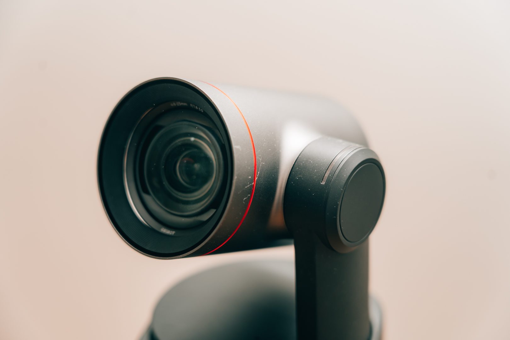 A close-up of the OBSBOT Tail 2 against a white backdrop. 