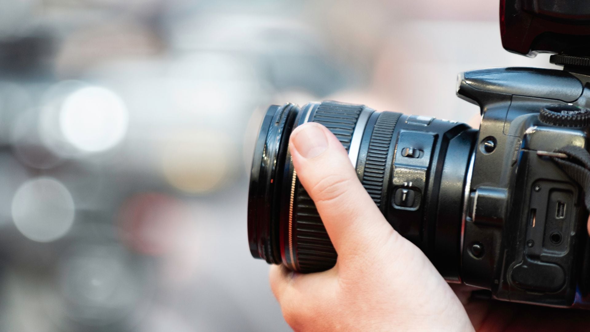Close-up shot of camera with focus on lens, ideal for product photography.