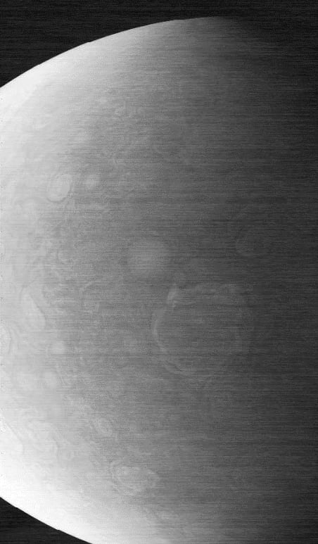 The graininess and horizontal lines seen in this JunoCam image show evidence that the camera aboard NASA’s Juno mission suffered radiation damage. The image, which captures one of the circumpolar cyclones on Jupiter’s north pole, was taken on Nov. 22, 2023. NASA/JPL-Caltech/SwRI/MSSS