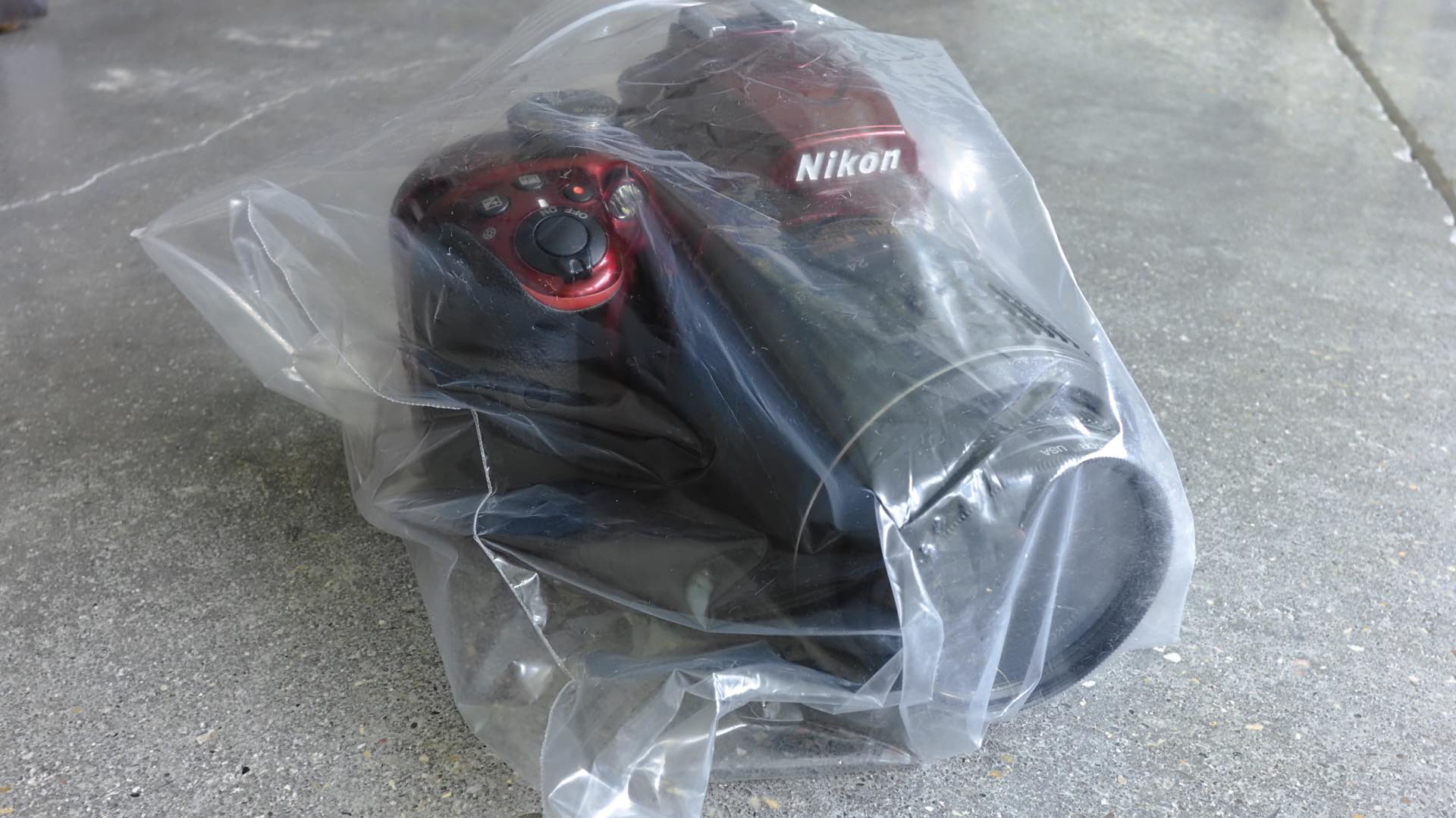 Nikon D3400 inside plastic bag protection for rain photography