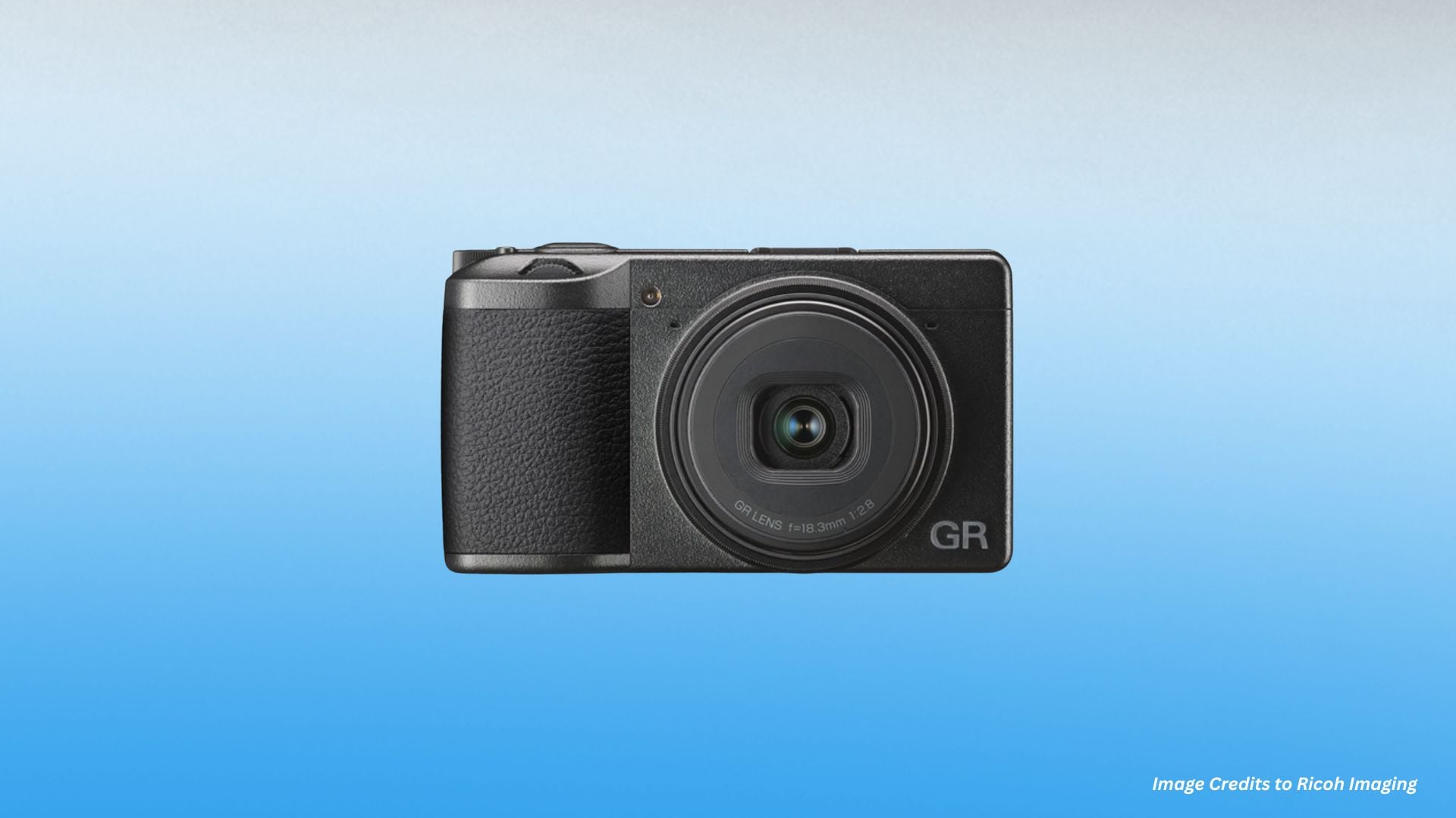 A Ricoh GR III camera held in hand, demonstrating its ultra-compact design and robust build. This camera is favored by street photographers and everyday carry enthusiasts for its quick response and high image quality in a pocket-sized form.