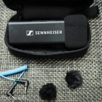 The Sennheiser Profile Wireless Mic System including charging base, pouch, windscreen attachments, and TRS cable.