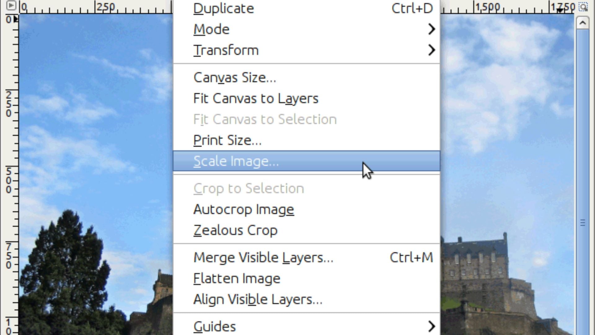 GIMP image menu dropdown with scale image option highlighted, showing canvas size, fit canvas to layers, print size, autocrop, and merge layers commands available.