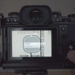 Fujifilm camera LCD screen displaying white balance shade adjustment menu. Shows RGB values at zero with SET and SHIFT options for color temperature control settings.