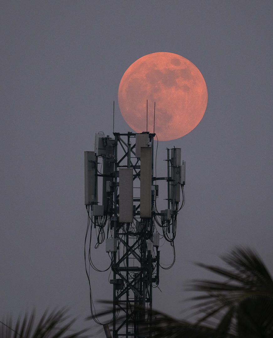 Under certain conditions, the moon might appear organish during moonrise
