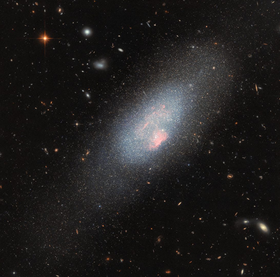 This glittering blue galaxy is a blue compact dwarf galaxy called Markarian 178 (Mrk 178). This galaxy, which is substantially smaller than our own Milky Way, lies 13 million light-years away in the constellation Ursa Major (The Great Bear). Credit: ESA/Hubble & NASA, F. Annibali, S. Hong