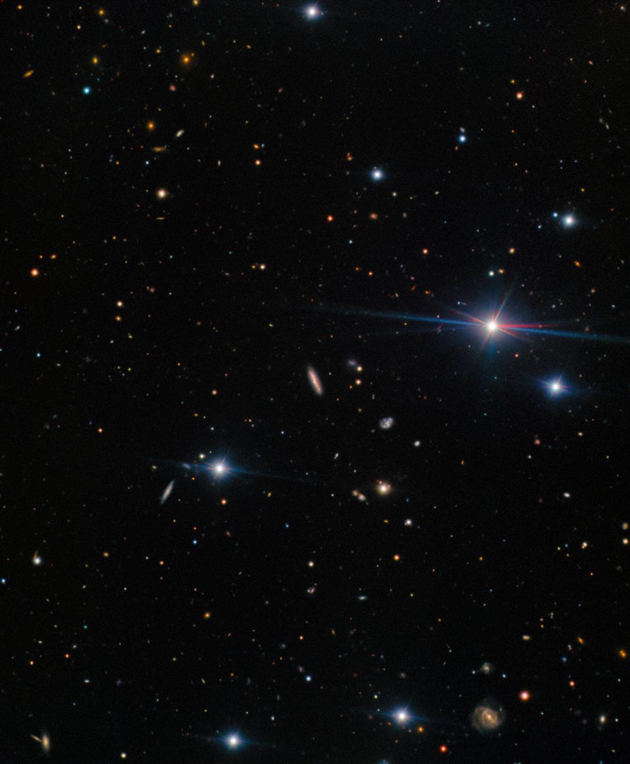 A representative color image of the field around AT2025ulz. The host galaxy of AT2025ulz is at the center of the image. Clumpy star forming regions can be seen across the galaxy. The transient is visible close to the center of the host, though clearly offset from the nucleus. Credit: International Gemini Observatory/NOIRLab/NSF/AURA