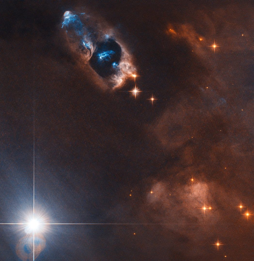 In this image, the NASA/ESA Hubble Space Telescope has captured the smoking gun of a newborn star, the Herbig–Haro objects numbered 7 to 11 (HH 7–11). Credit: ESA/Hubble & NASA, K. Stapelfeldt