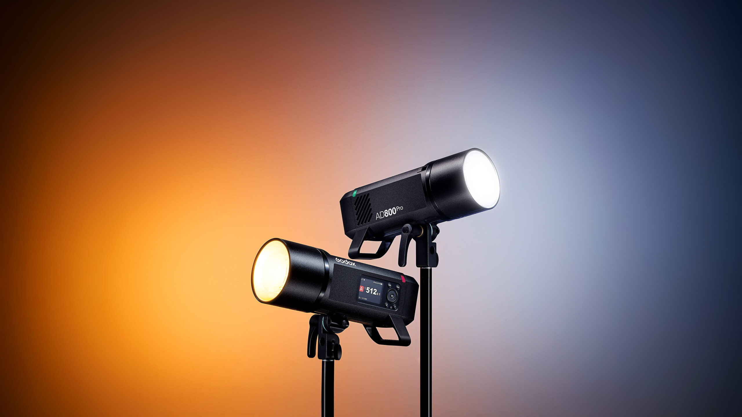 Two Godox AD 800 Pro Lights on a multicolored backdrop