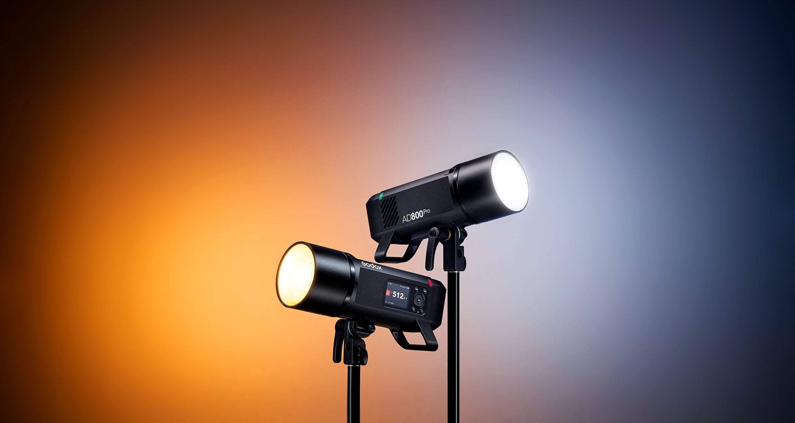 Two Godox AD 800 Pro Lights on a multicolored backdrop