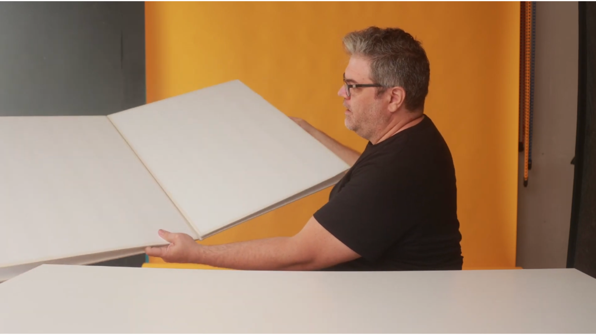 A step-by-step guide to creating a DIY V-flat, an essential tool for photographers to shape and control light in the studio, enhancing your shooting setup.