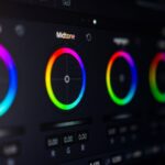 Photo editing software displaying four color wheels with rainbow gradient rings for adjusting midtones and color balance in post-processing workflow