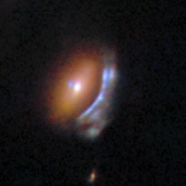 Two dramatically different galaxies are revealed in this Hubble image. A compact, reddish elliptical galaxy is accompanied by a blue spiral galaxy squashed into an arc shape. This is the result of gravitational lensing. Credit: ESA/Hubble & NASA, D. O’Ryan, P. Gómez (European Space Agency), M. Zamani (ESA/Hubble)