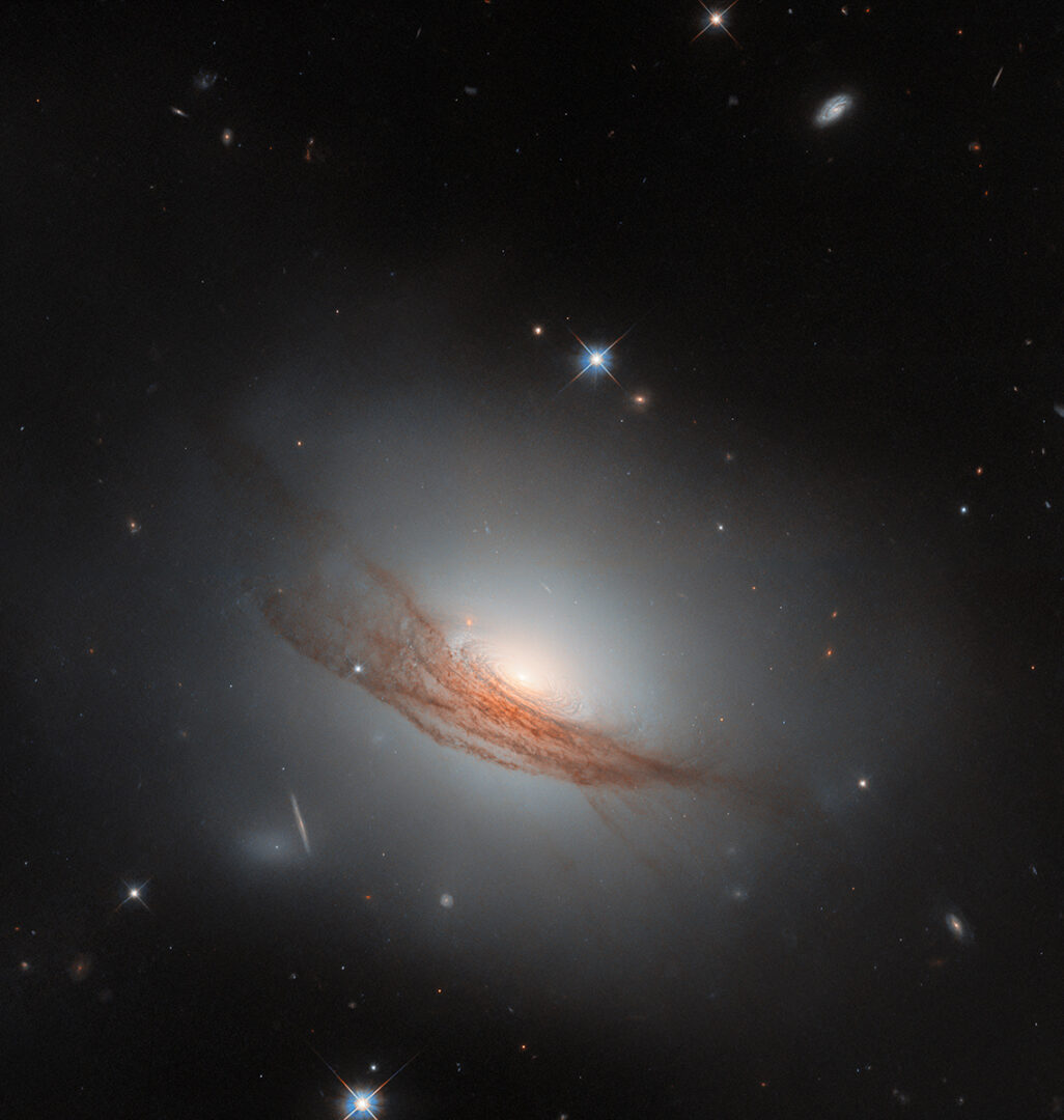 Hubble Space Telescope's wide view of NGC 7722, a lenticular galaxy located about 187 million light-years away in the constellation Pegasus.Credit: ESA/Hubble & NASA, R. J. Foley (UC Santa Cruz), Dark Energy Survey/DOE/FNAL/DECam/CTIO/NOIRLab/NSF/AURA
