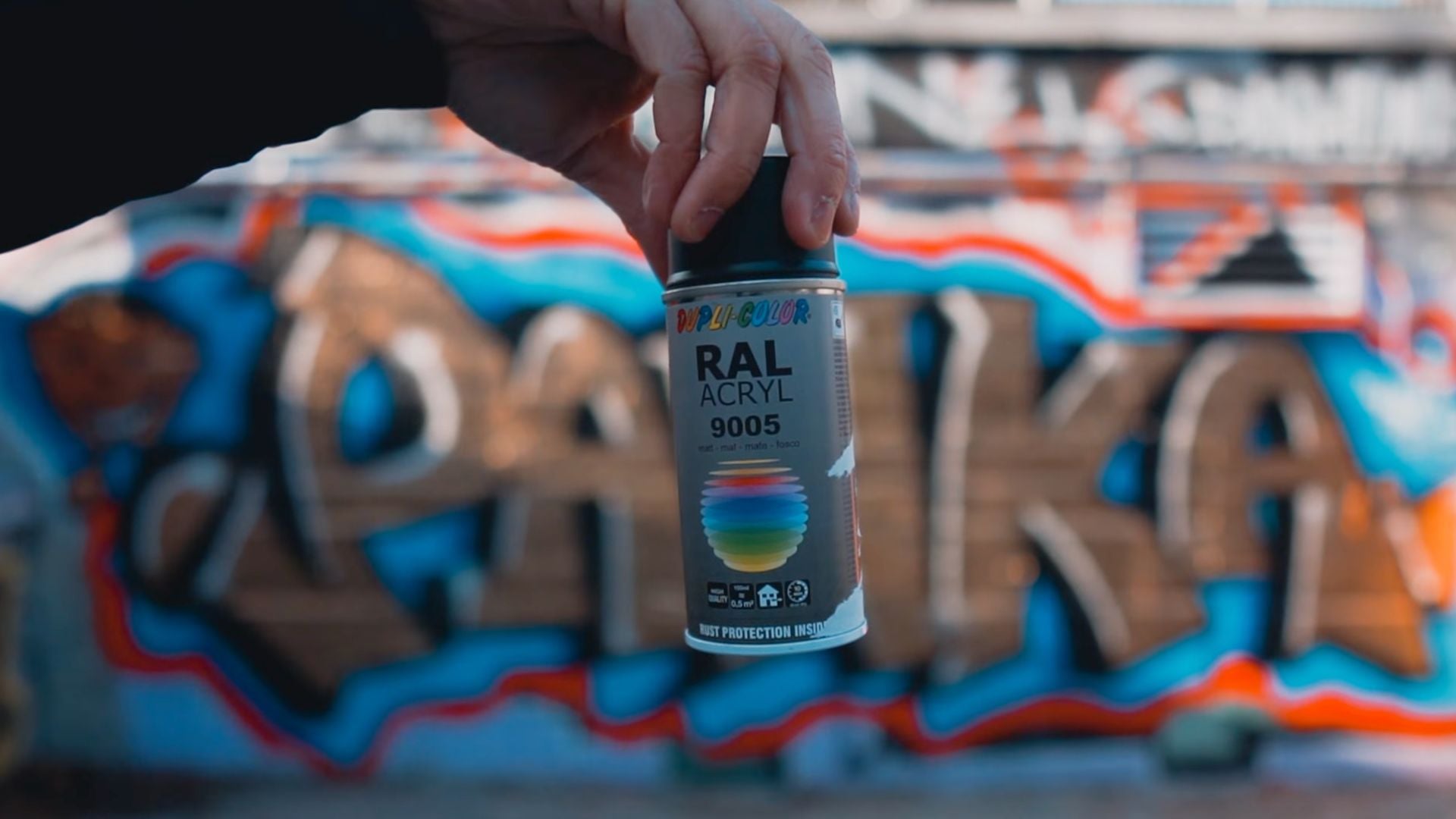 Instructions for making a DIY Pro Mist filter with black spray paint to achieve a smoky, diffused look in your footage.