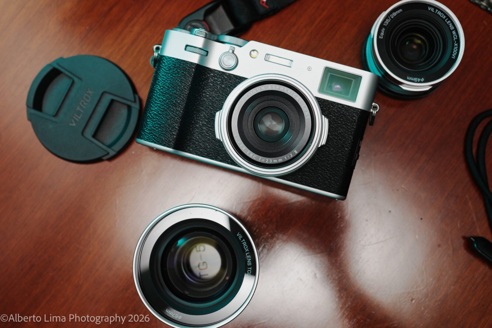 A product image of the Viltrox WCL-X100VI at the top right and the Viltrox TCL-X100VI at the bottom of the frame.