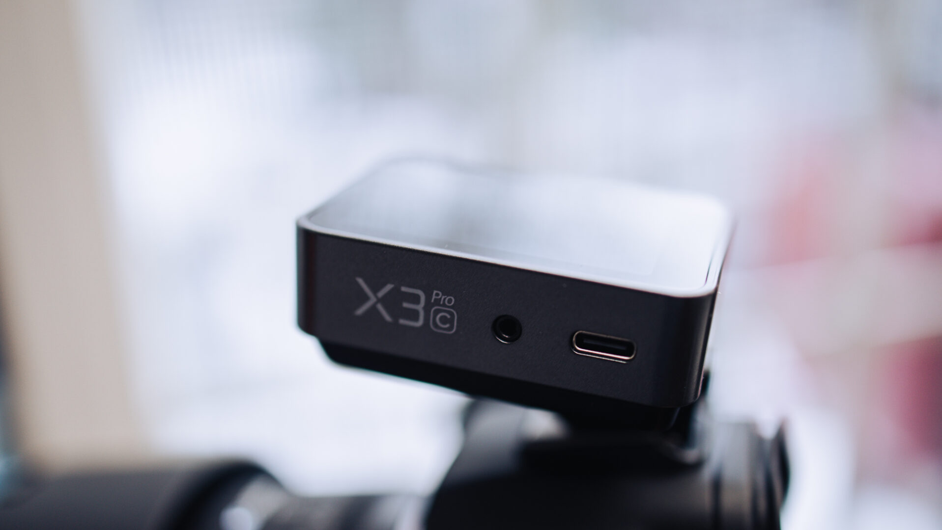 Godox X3 Pro Trigger with X3 and sync port and USB-C Port visible.