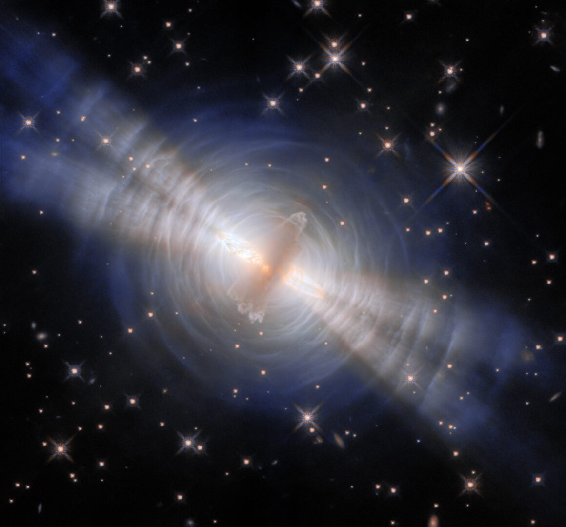 This newly processed image from the NASA/ESA Hubble Space Telescope is the clearest view yet of the Egg Nebula. It is a preplanetary nebula, a structure of gas and dust created as a Sun-like star approaches the end of its life. Credit: NASA, ESA, Bruce Balick (UWashington)