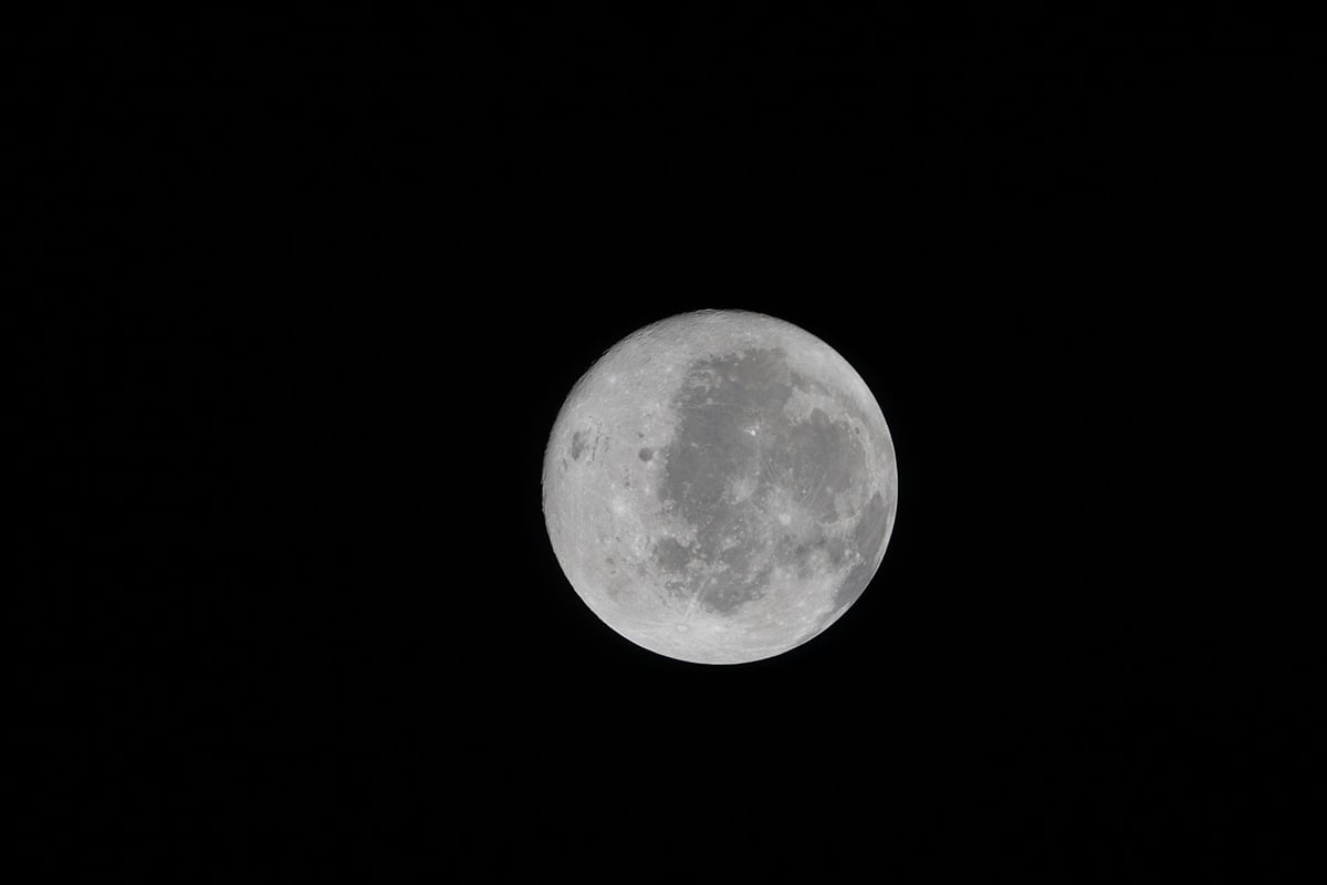 A view of the nearside of the Moon, the side we always see from Earth. Some of the far side is visible, as well, on the left edge. Credit: NASA
